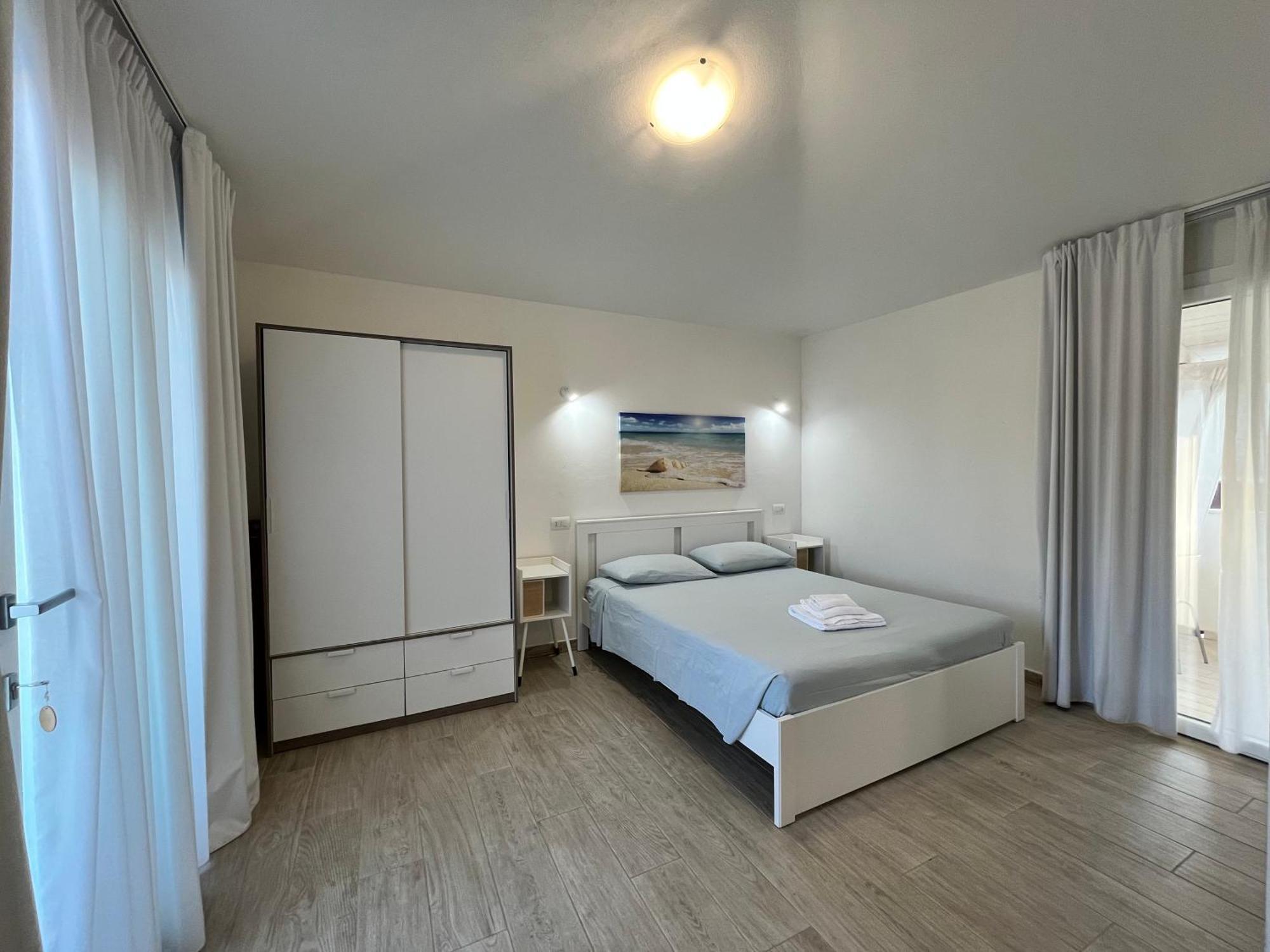 Case Vacanze "Bianco Mare" Porto Pino Luaran gambar