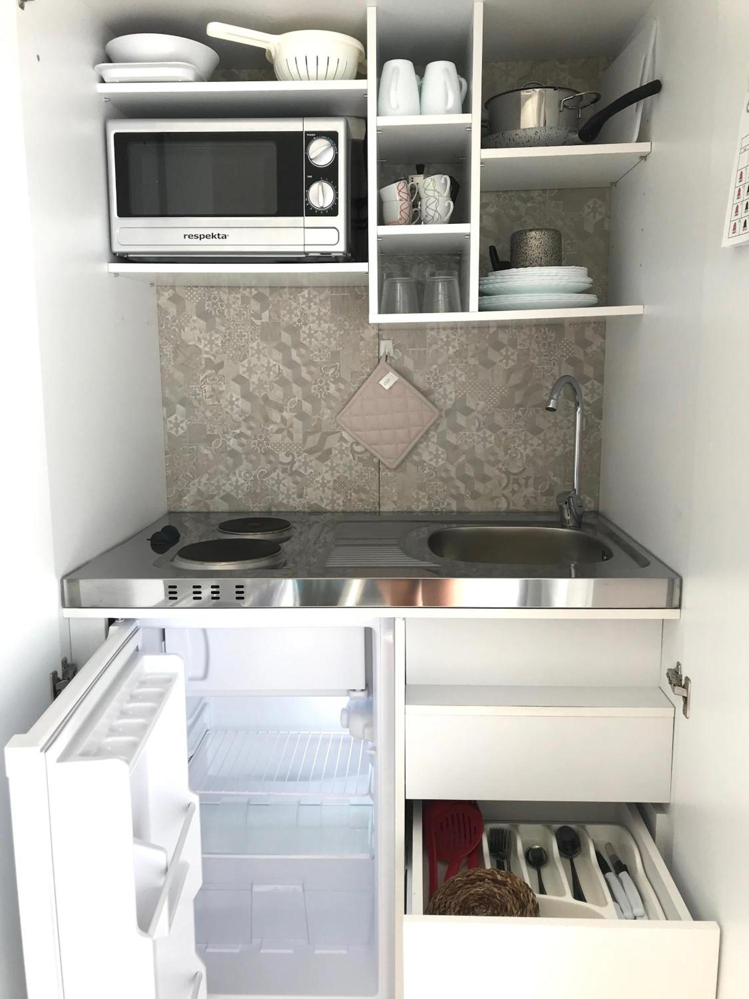 Case Vacanze "Bianco Mare" Porto Pino Bilik gambar