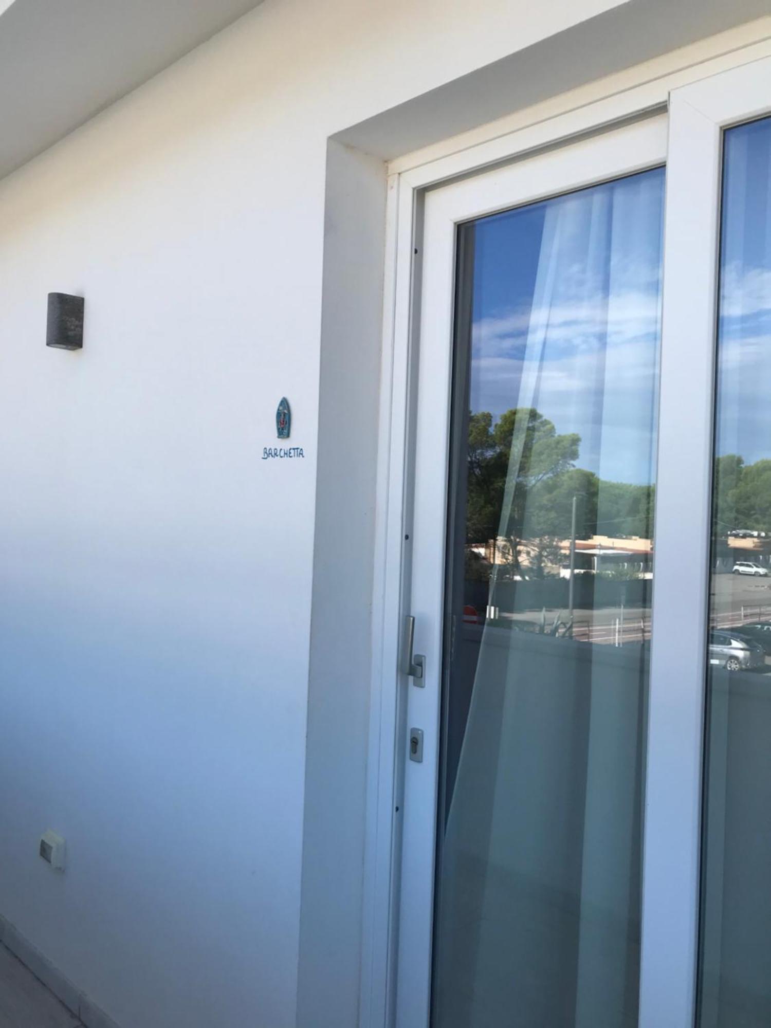 Case Vacanze "Bianco Mare" Porto Pino Bilik gambar