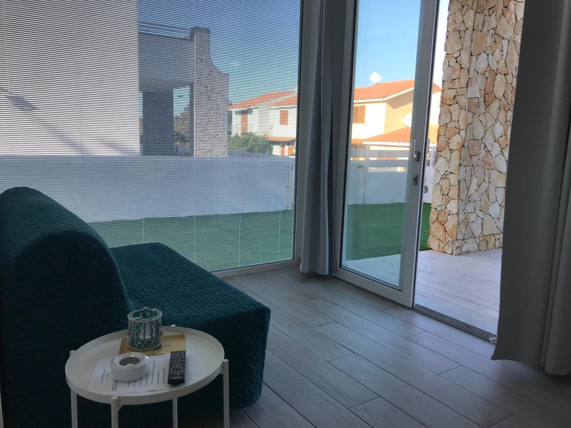 Case Vacanze "Bianco Mare" Porto Pino Bilik gambar