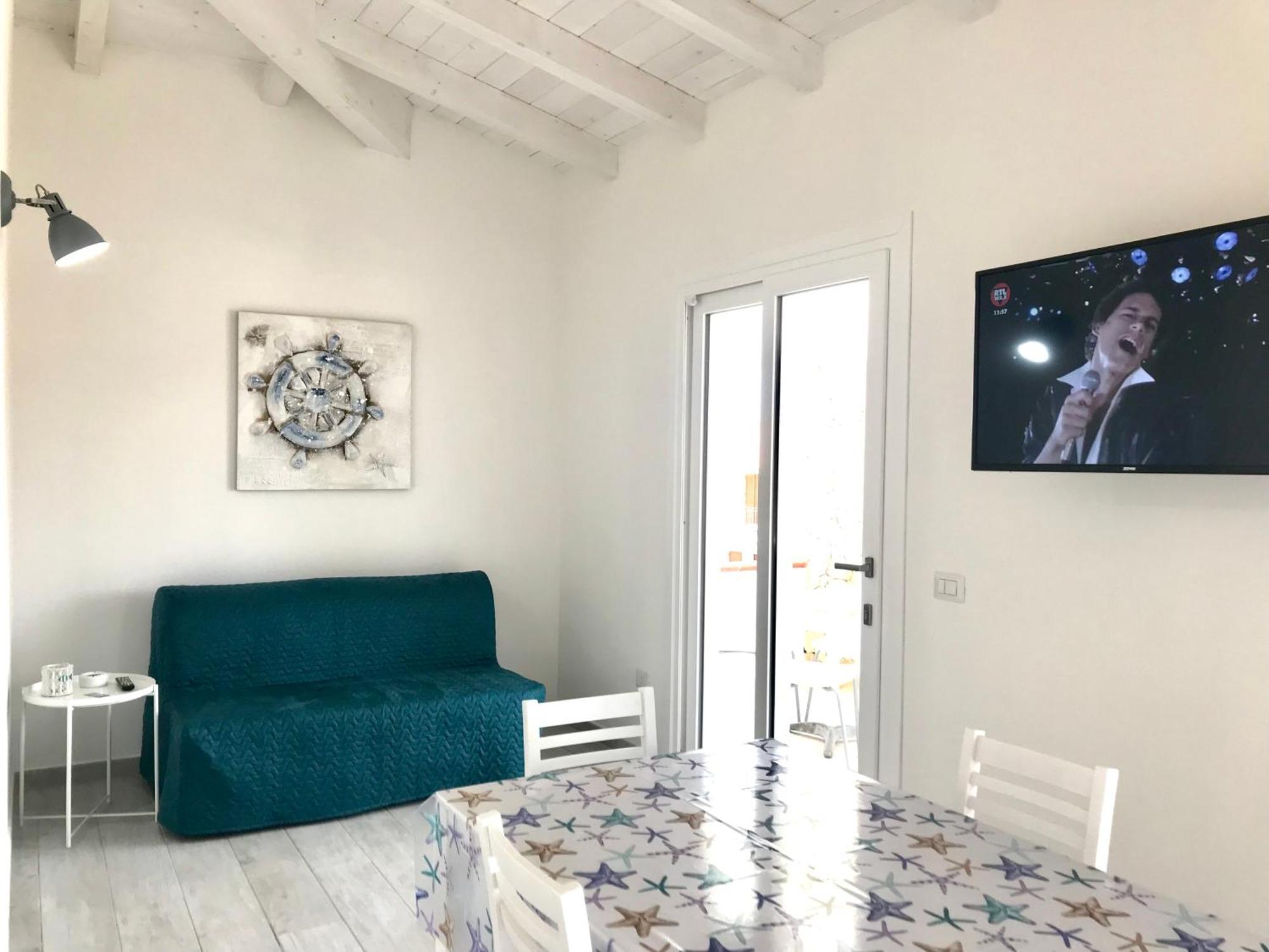 Case Vacanze "Bianco Mare" Porto Pino Bilik gambar