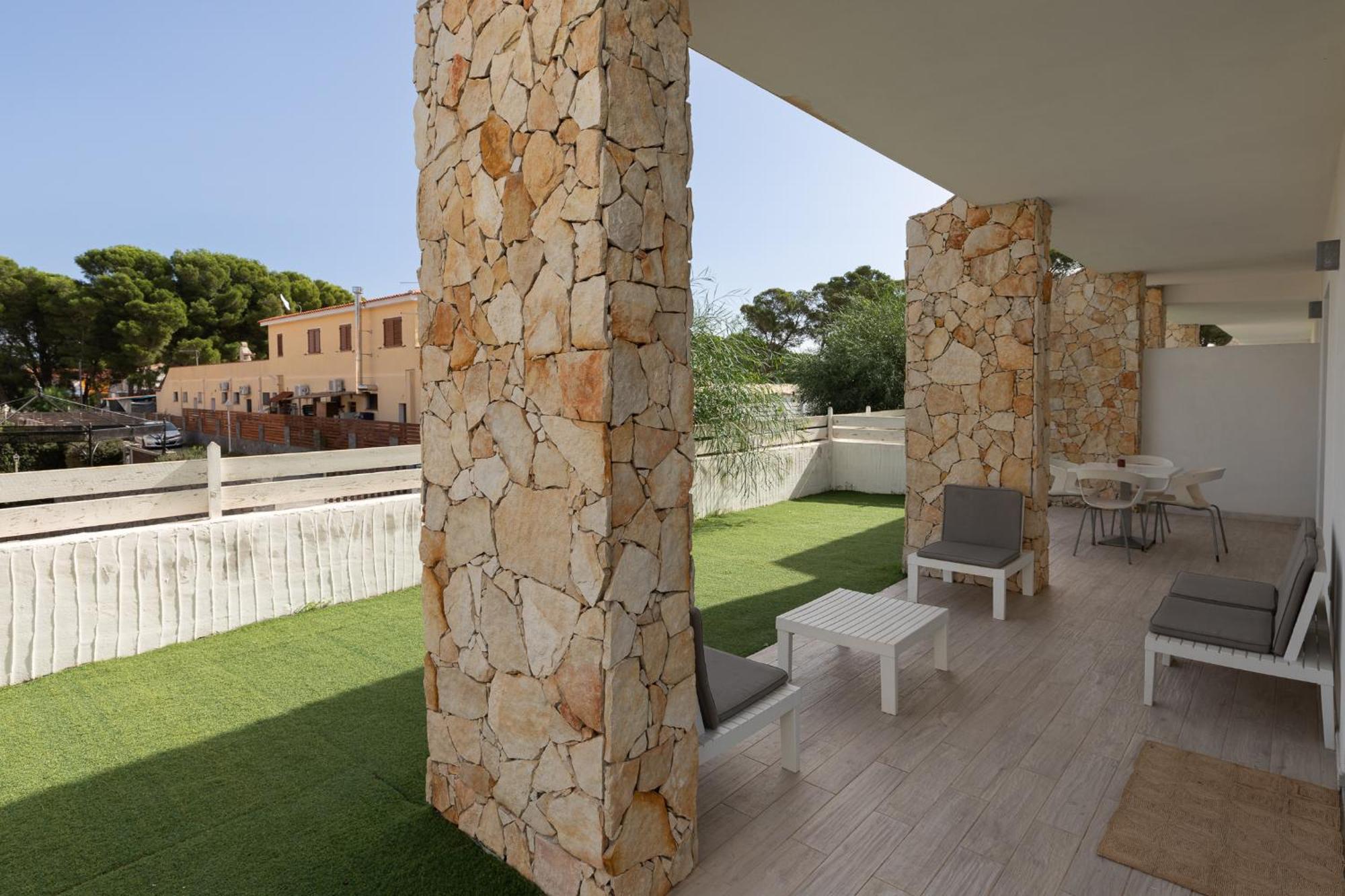 Case Vacanze "Bianco Mare" Porto Pino Luaran gambar