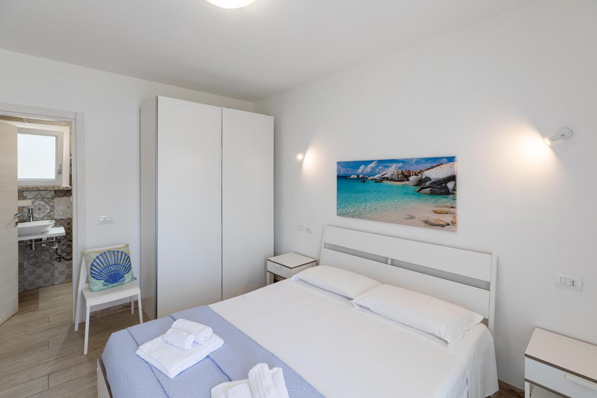 Case Vacanze "Bianco Mare" Porto Pino Bilik gambar