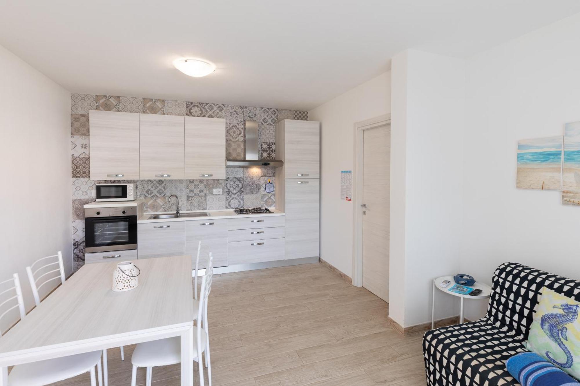 Case Vacanze "Bianco Mare" Porto Pino Luaran gambar