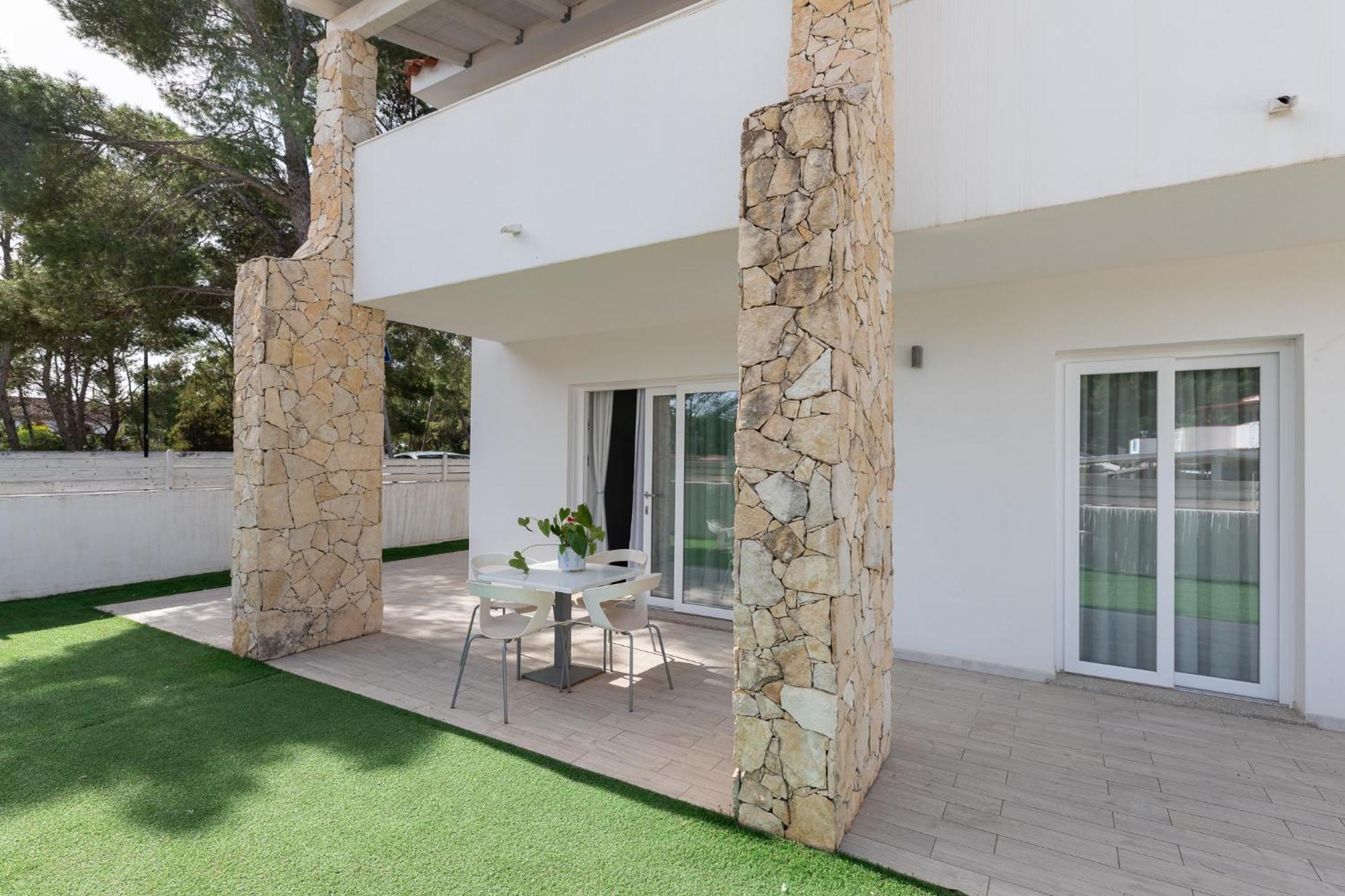 Case Vacanze "Bianco Mare" Porto Pino Bilik gambar