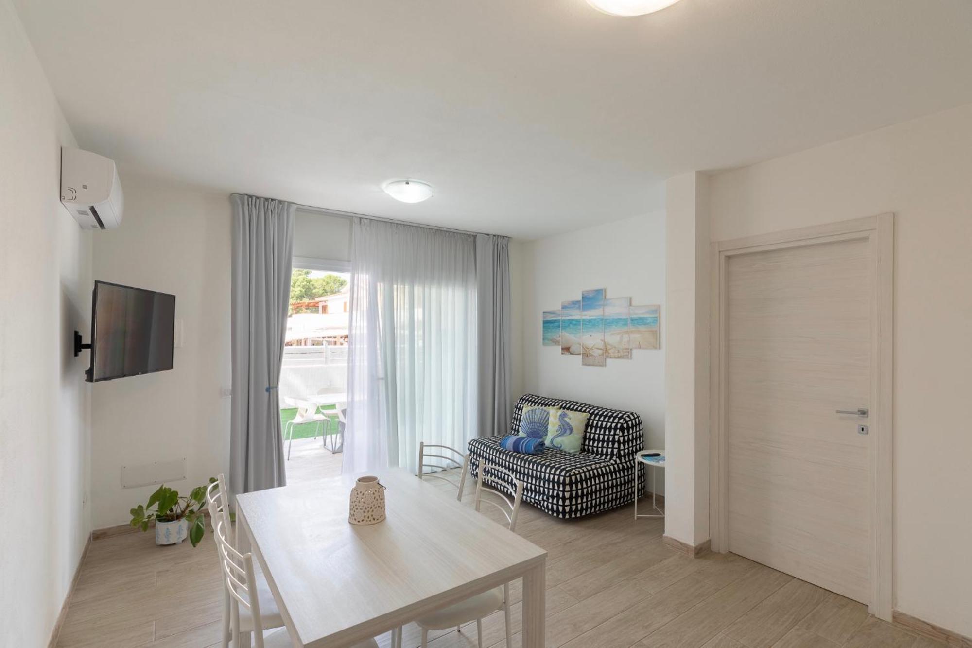 Case Vacanze "Bianco Mare" Porto Pino Bilik gambar