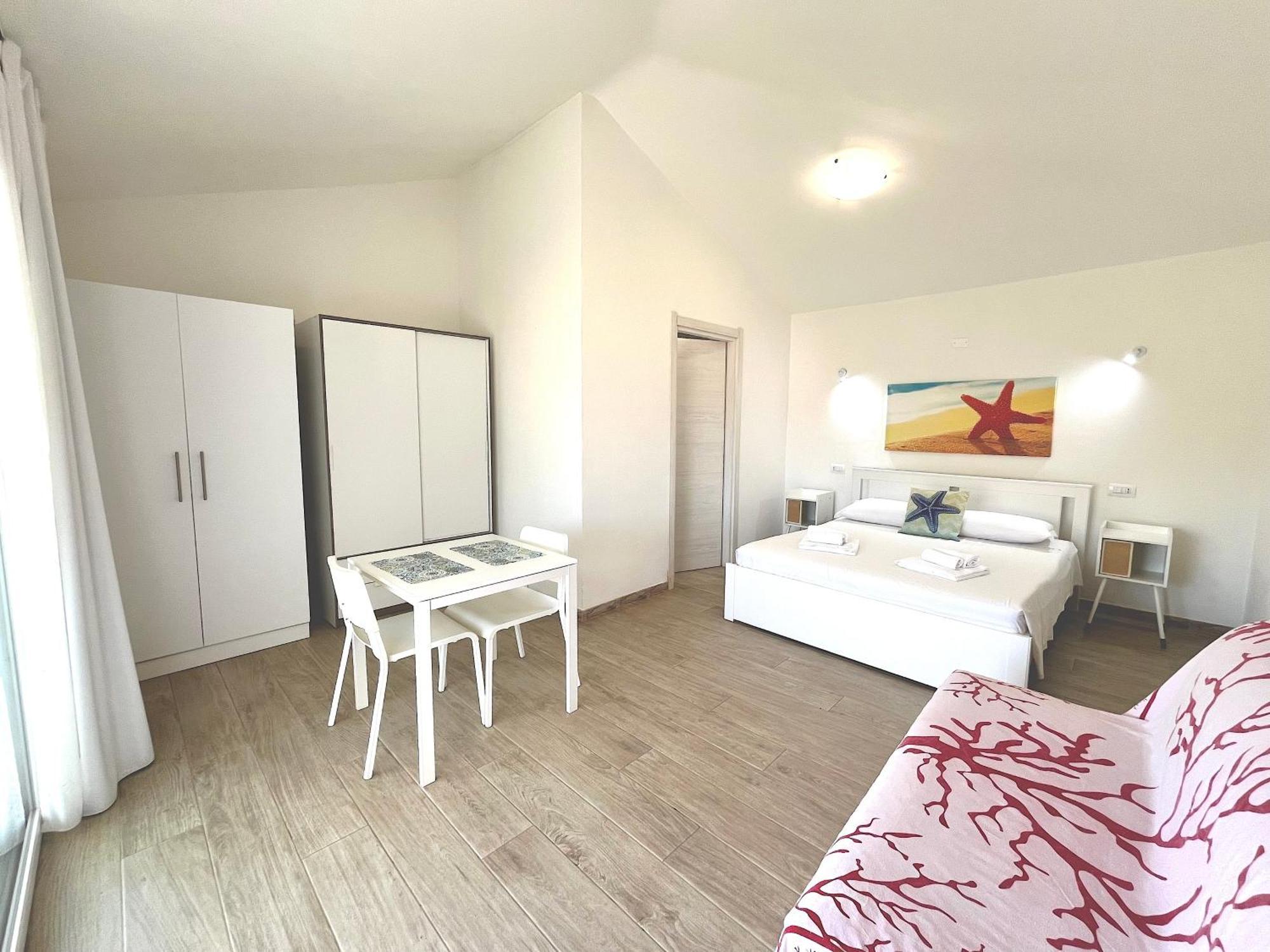 Case Vacanze "Bianco Mare" Porto Pino Luaran gambar